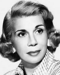 Bea Benaderet smiling in a mid-century studio portrait