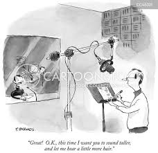 Voice actor recording in a studio with classic cartoon sketches behind them